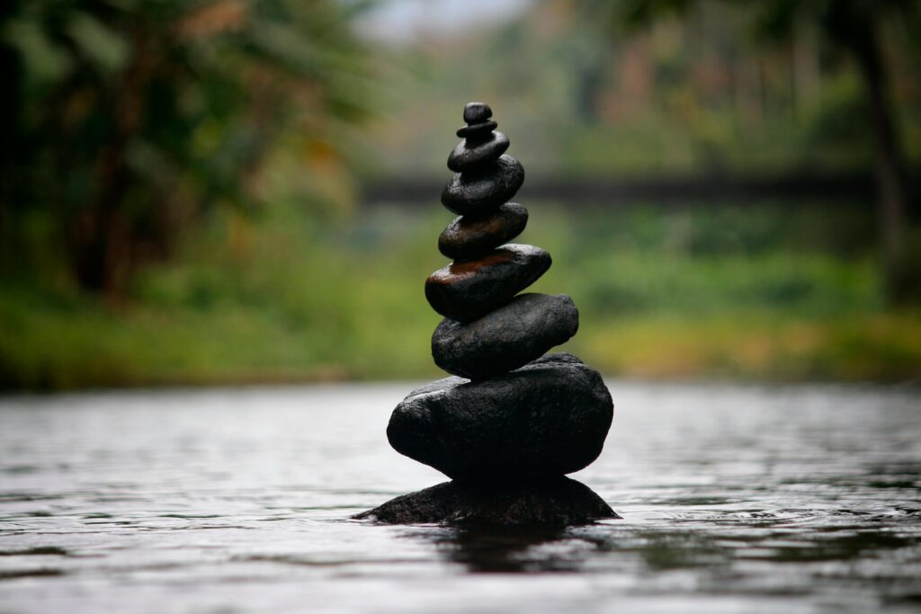 pexels photo 312839 312839 Balanced stones in a serene river evoke a sense of peace and tranquility.